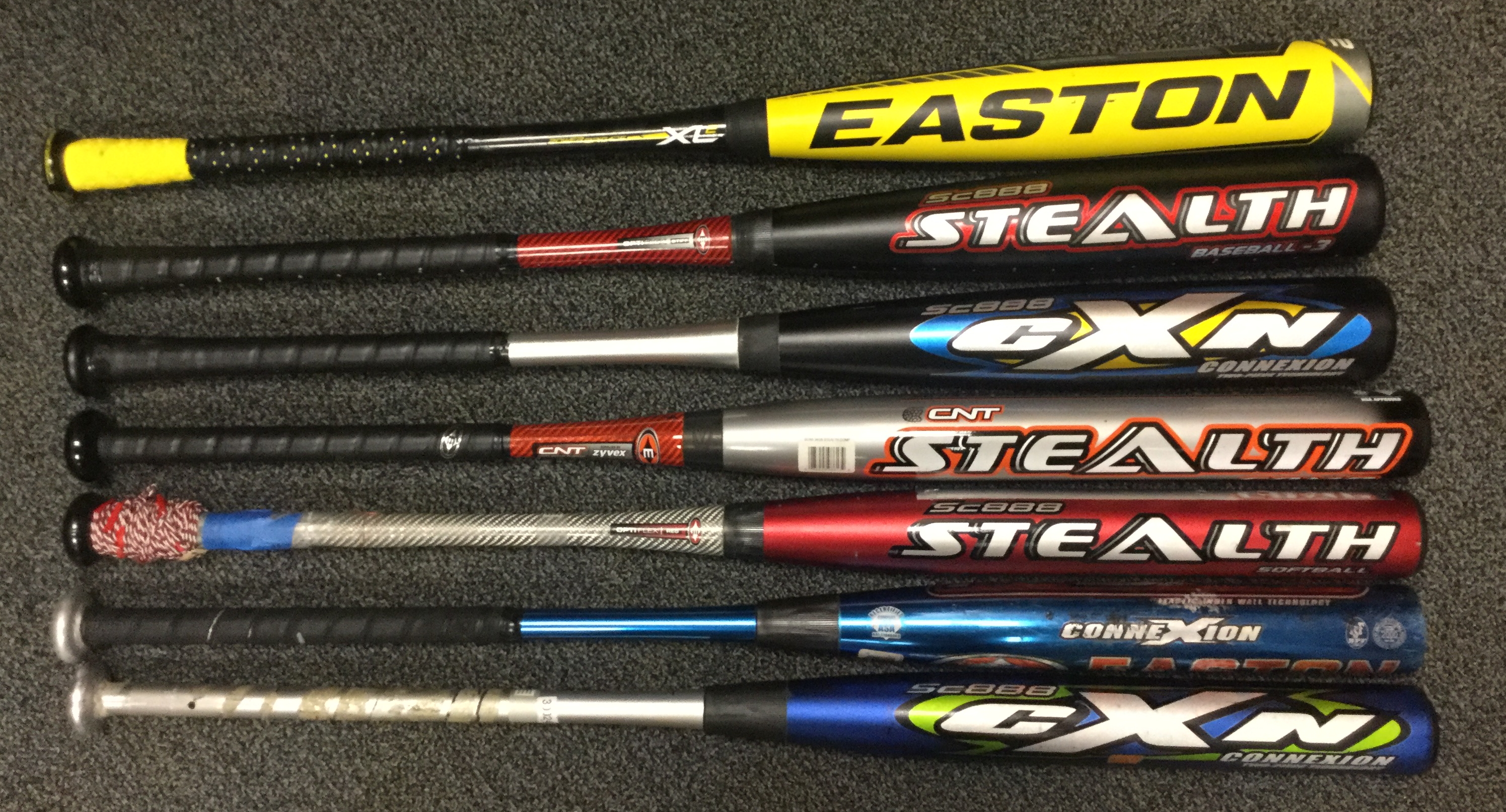 photo of several Easton softball and baseball bats with teh ConneXion joint